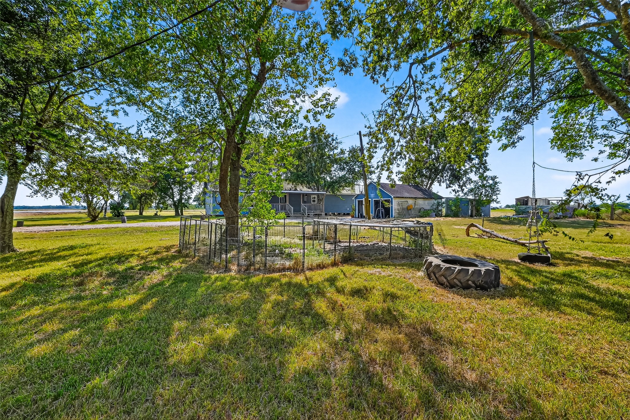 6434 Boothline Road Richmond, TX 77469 - Photo 31 of 36 a view of a swimming pool with an outdoor seating and a yard