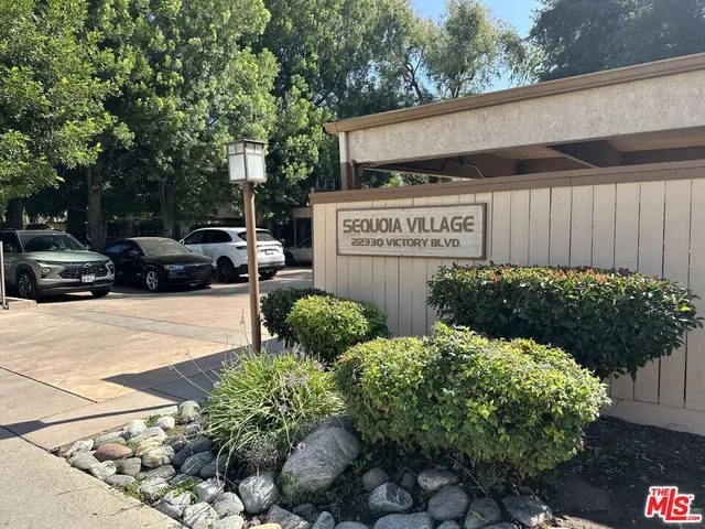 a view of a street with some trees