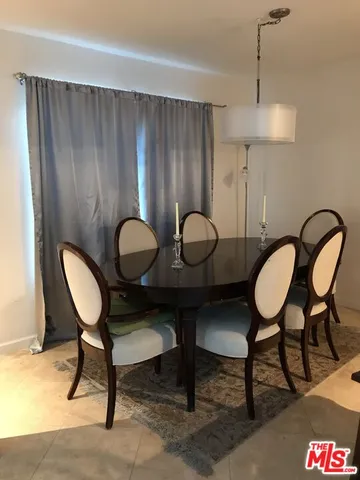 a view of a workspace with furniture