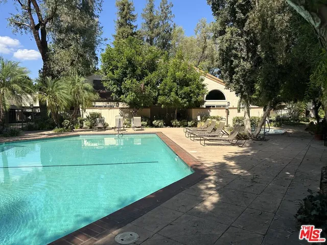 a view of a house with swimming pool