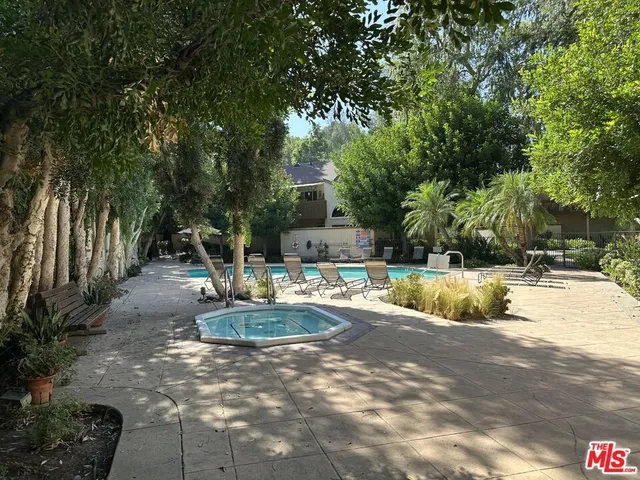 a view of a backyard of a house