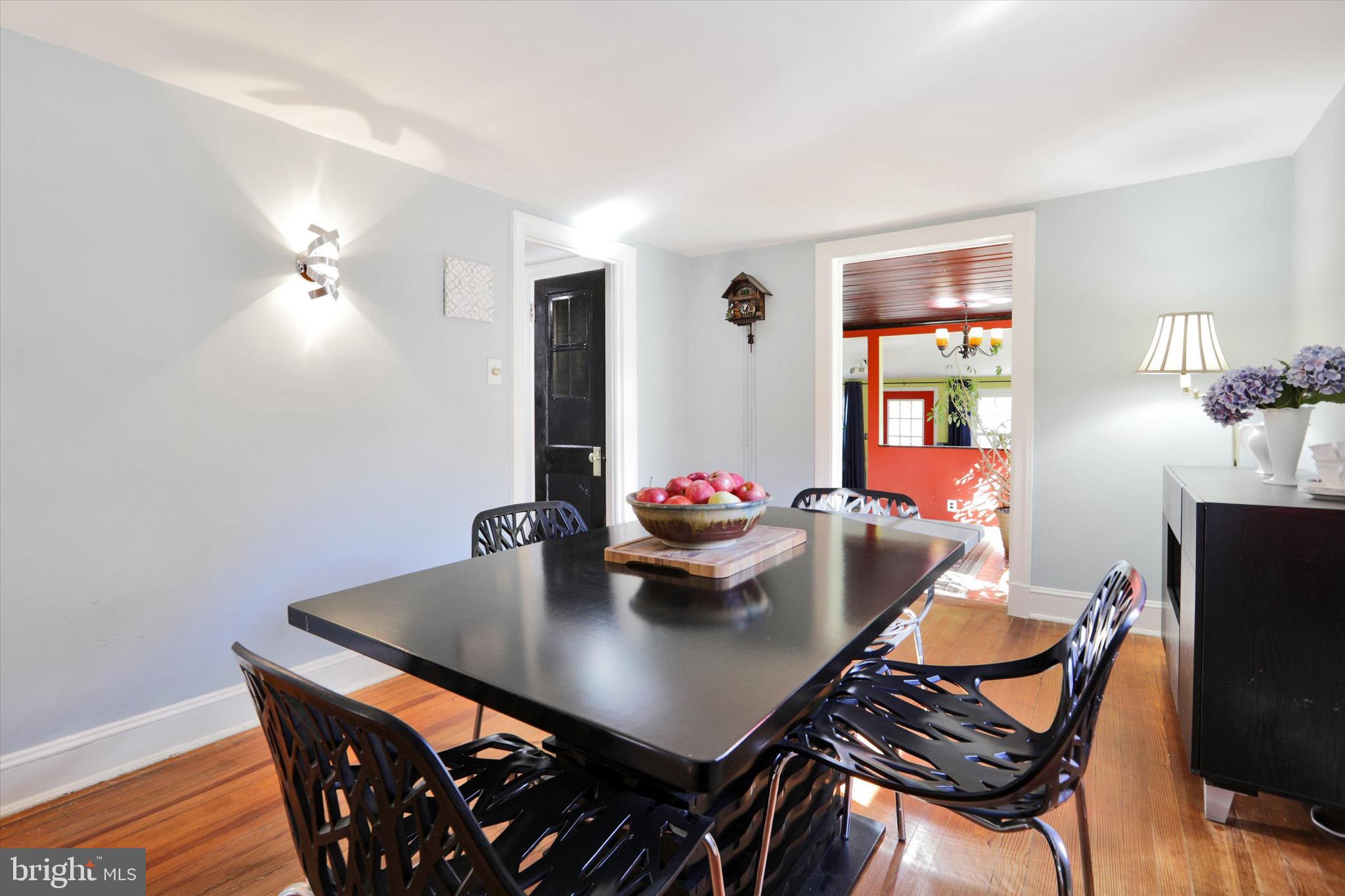 220 West Timonium Road Lutherville-Timonium, MD 21093 - Photo 11 of 64 a view of a dining room with furniture and a potted plant