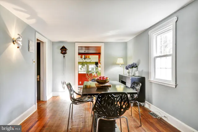 a view of a chairs and table in a patio
