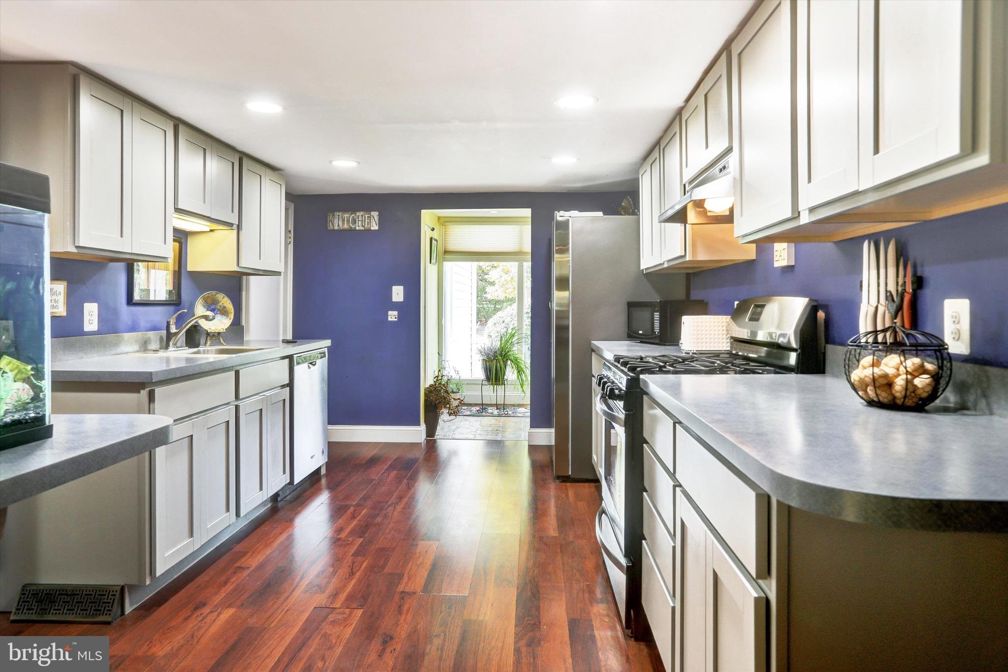 220 West Timonium Road Lutherville-Timonium, MD 21093 - Photo 16 of 64 a kitchen with counter top space a sink appliances and cabinets