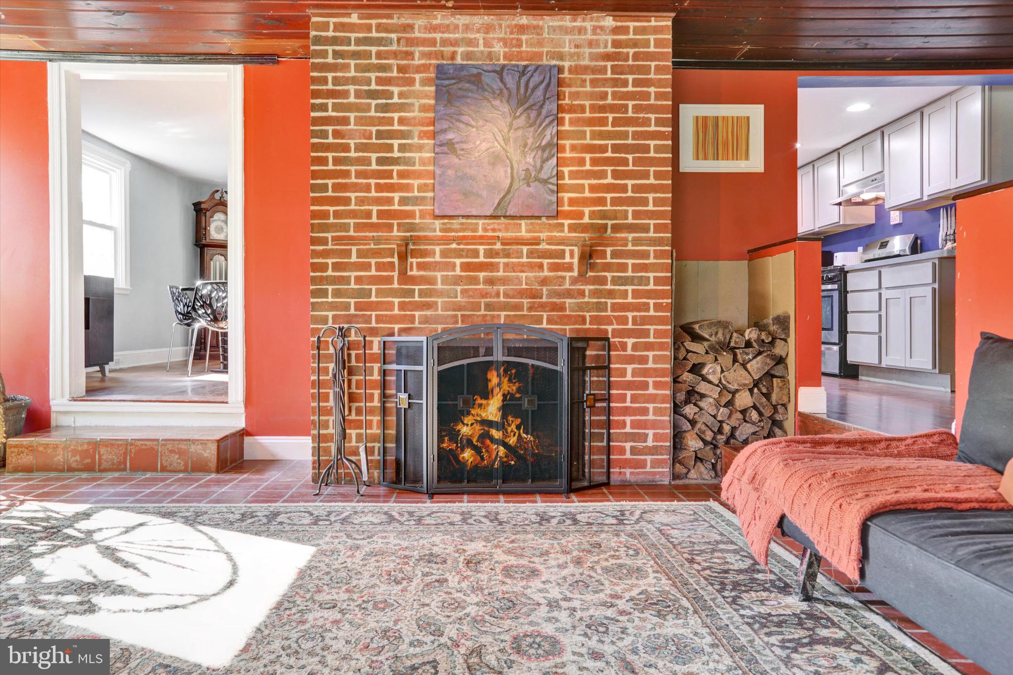 220 West Timonium Road Lutherville-Timonium, MD 21093 - Photo 19 of 64 a bed room with a bed and a fireplace