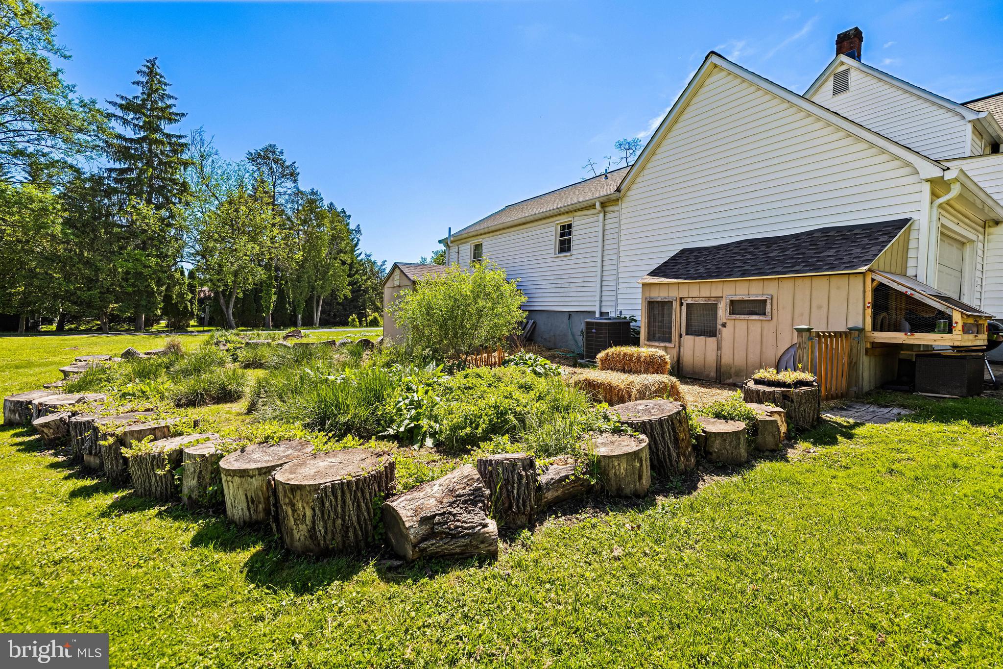 220 West Timonium Road Lutherville-Timonium, MD 21093 - Photo 51 of 64 a view of a backyard with sitting area and garden