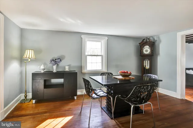 a kitchen with counter top space a sink appliances and cabinets