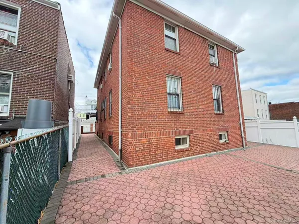 a front view of a house with stairs