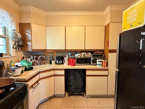 a kitchen with stainless steel appliances a sink and a stove