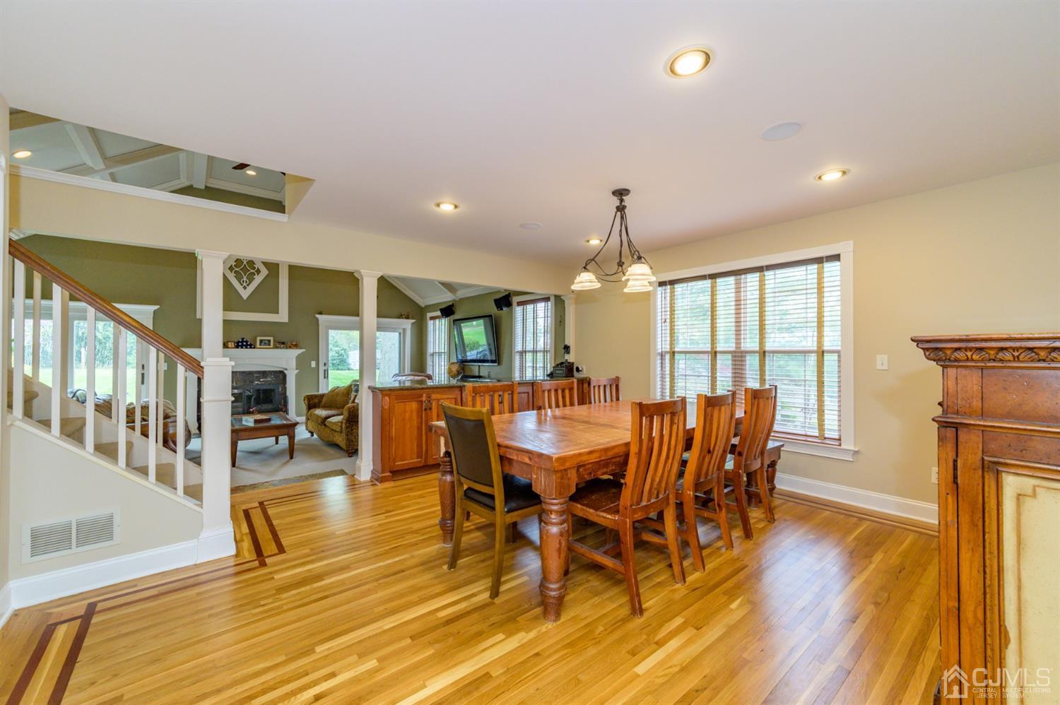 36 Cedar Grove Road Branchburg, NJ 08876 - Photo 13 of 51 a view of a dining room with furniture and wooden floor