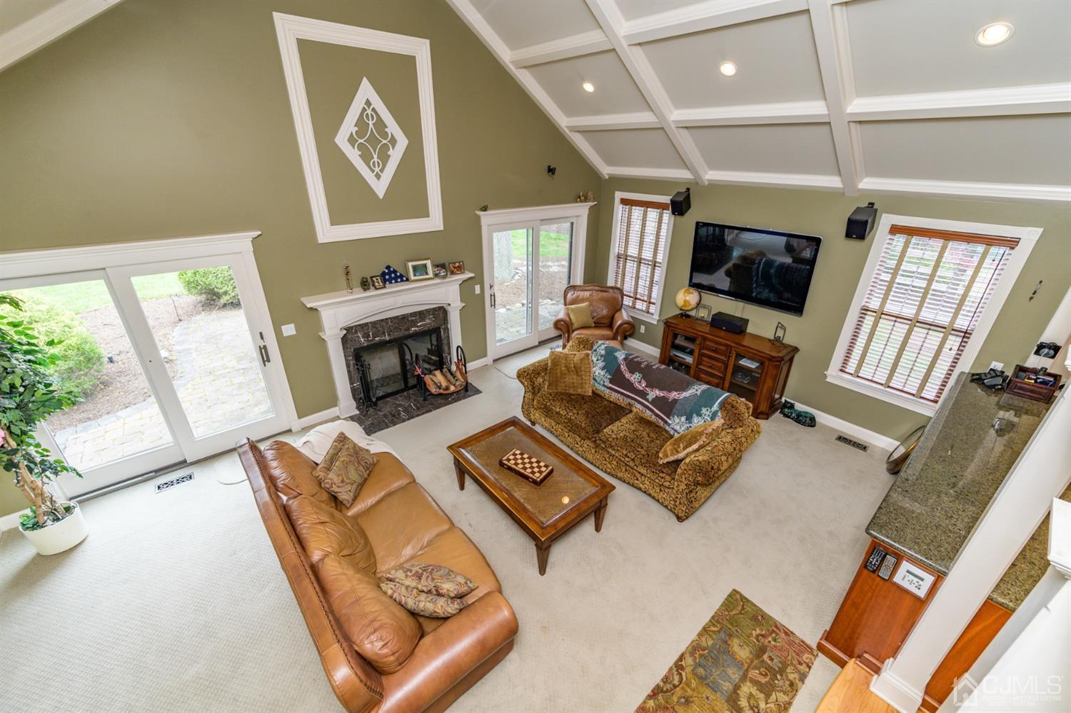 36 Cedar Grove Road Branchburg, NJ 08876 - Photo 20 of 51 a living room with furniture fireplace and a flat screen tv