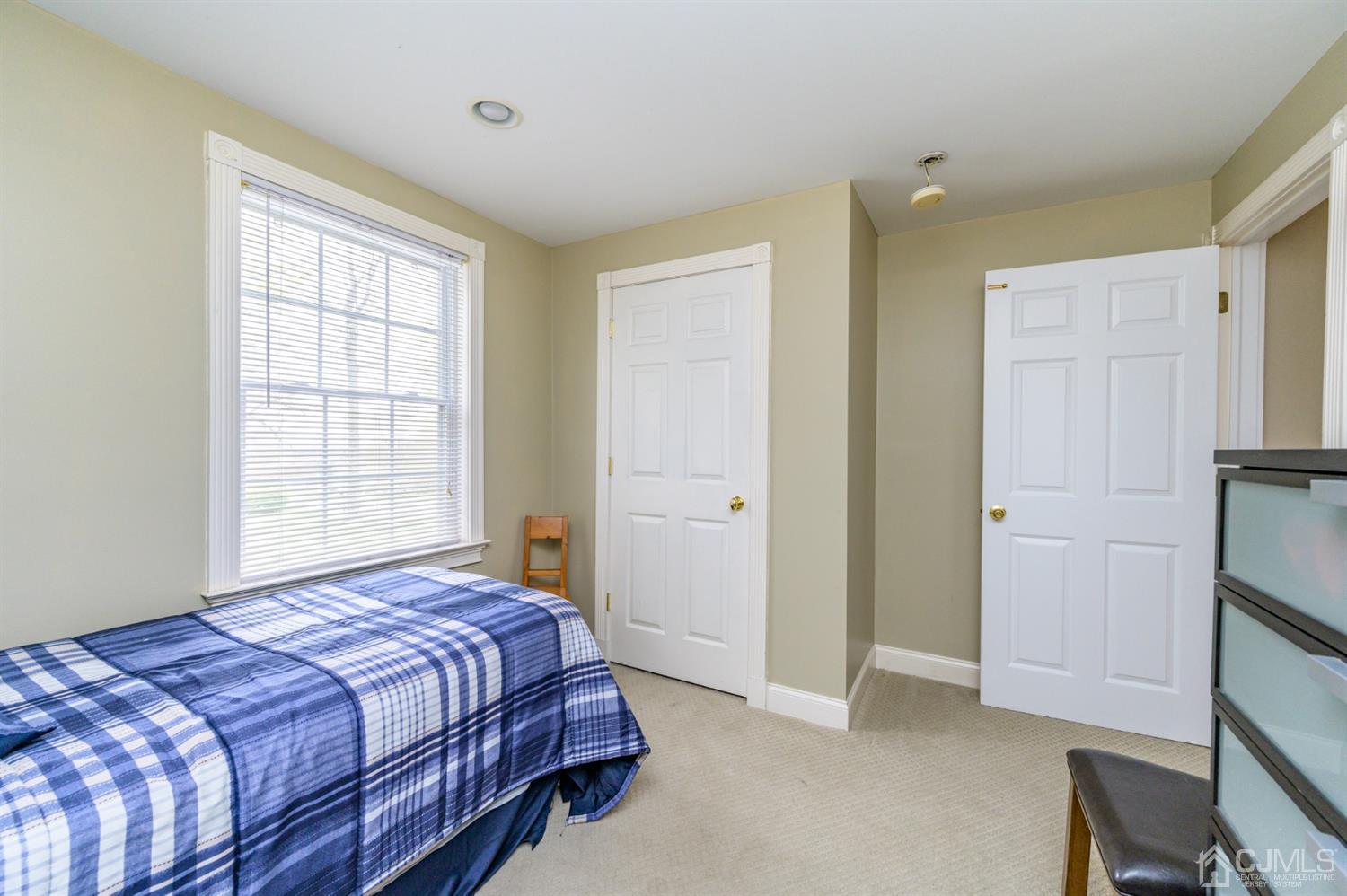 36 Cedar Grove Road Branchburg, NJ 08876 - Photo 22 of 51 a bedroom with a bed and a window
