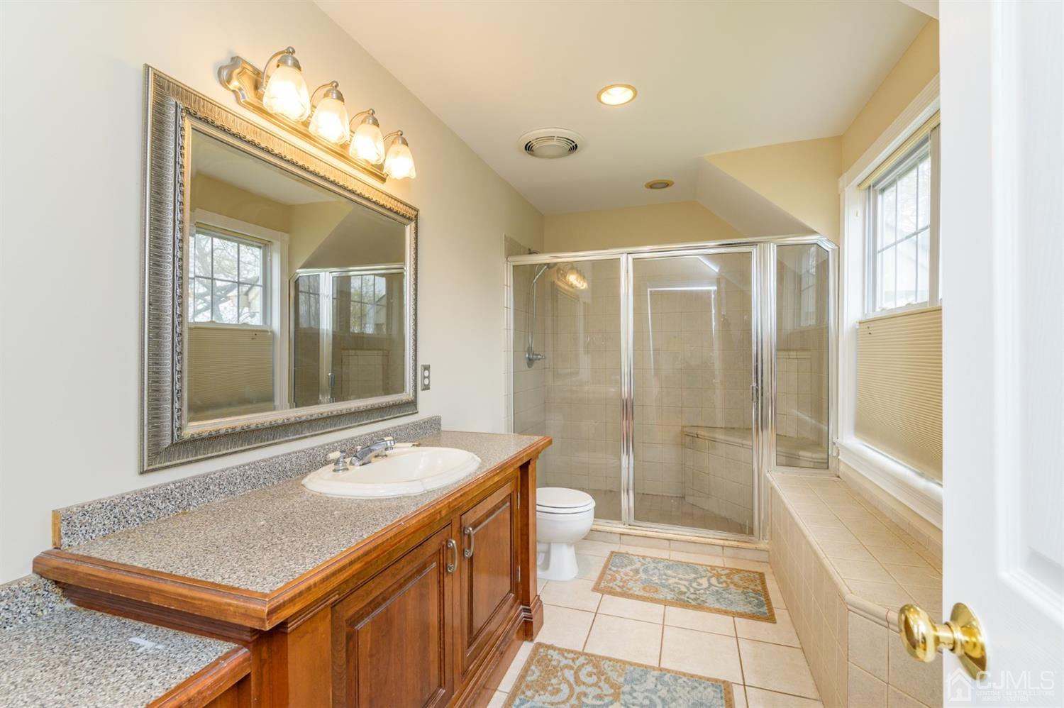 36 Cedar Grove Road Branchburg, NJ 08876 - Photo 28 of 51 a bathroom with a sink double vanity and a mirror