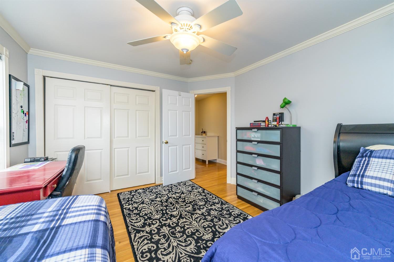 36 Cedar Grove Road Branchburg, NJ 08876 - Photo 32 of 51 a bedroom with a bed and wooden floor