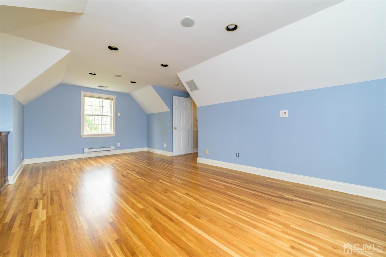 36 Cedar Grove Road Branchburg, NJ 08876 - Photo 34 of 51 a view of empty room with window and wooden floor