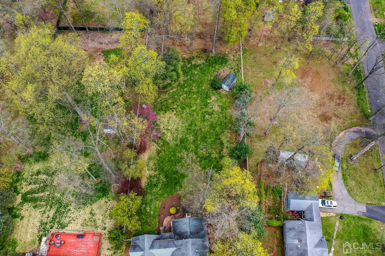 36 Cedar Grove Road Branchburg, NJ 08876 - Photo 49 of 51 a backyard of a house with lots of green space