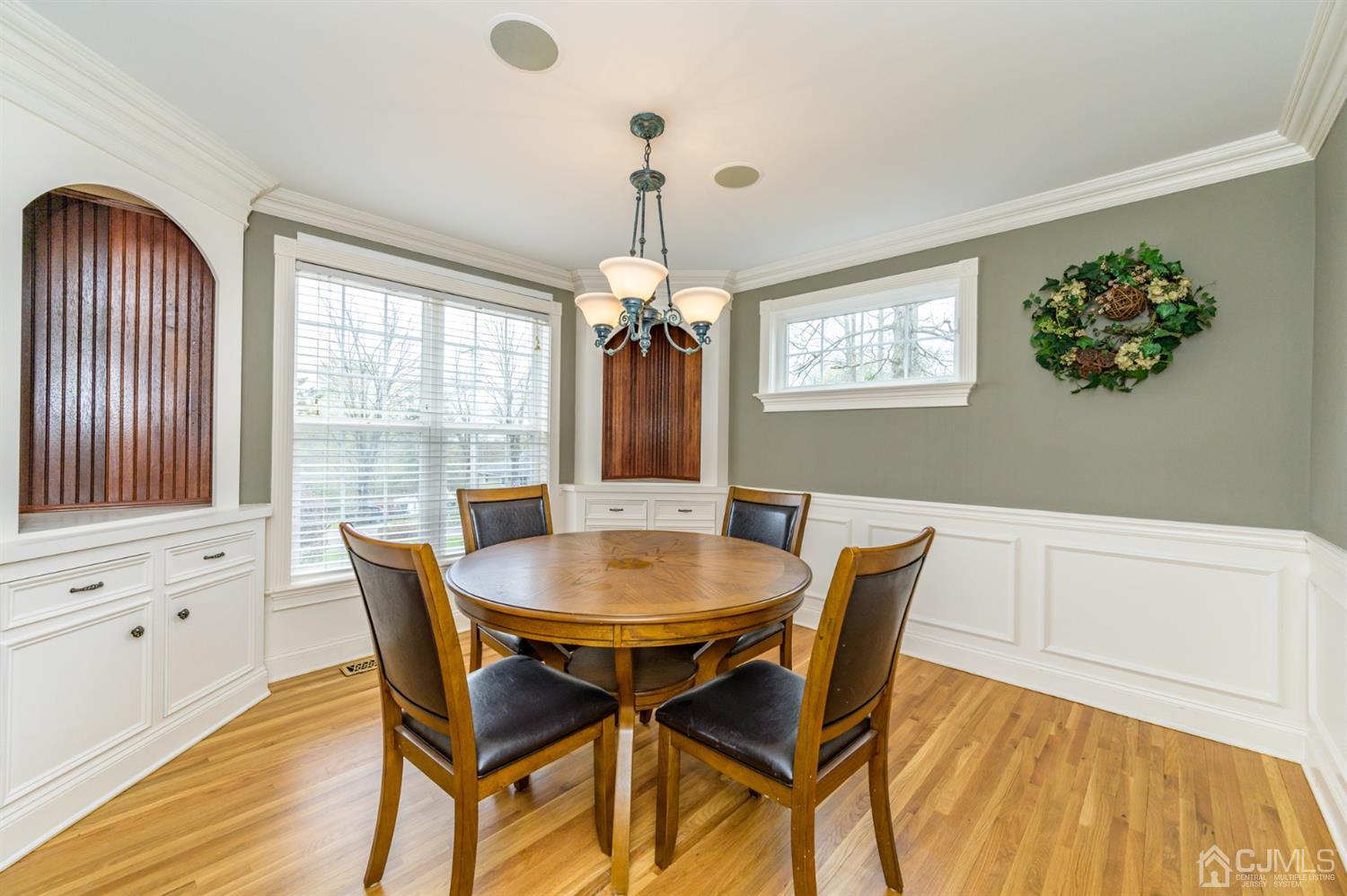 36 Cedar Grove Road Branchburg, NJ 08876 - Photo 7 of 51 a dining room with furniture a chandelier and wooden floor
