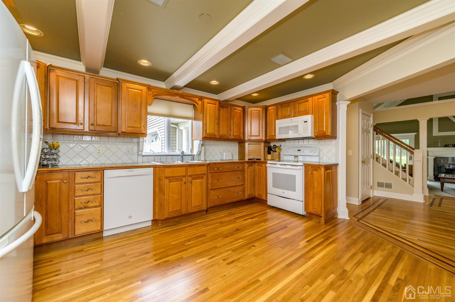 36 Cedar Grove Road Branchburg, NJ 08876 - Photo 9 of 51 a kitchen with granite countertop a sink cabinets and stainless steel appliances