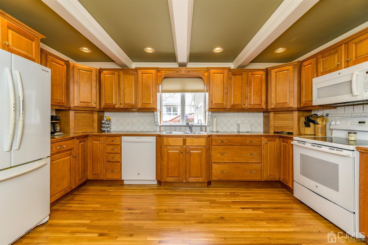 36 Cedar Grove Road Branchburg, NJ 08876 - Photo 10 of 51 a kitchen with stainless steel appliances granite countertop a sink window and cabinets