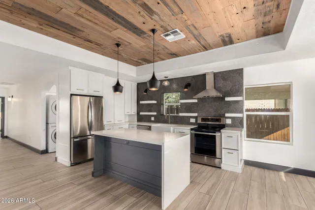 a view of a livingroom with wooden floor