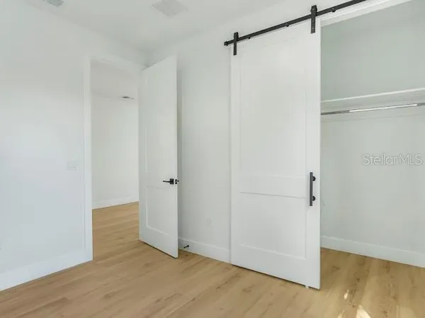 a bathroom with a bathtub and a toilet