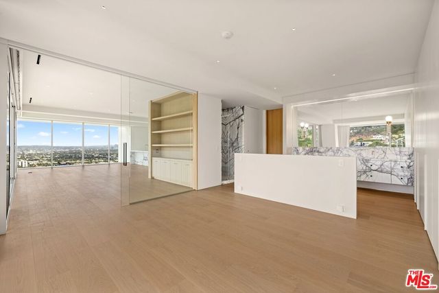 a spacious bathroom with a bathtub and shower