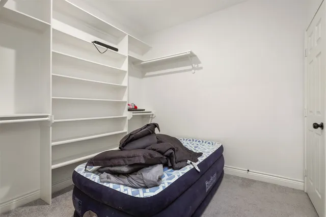 a room with furniture and a window