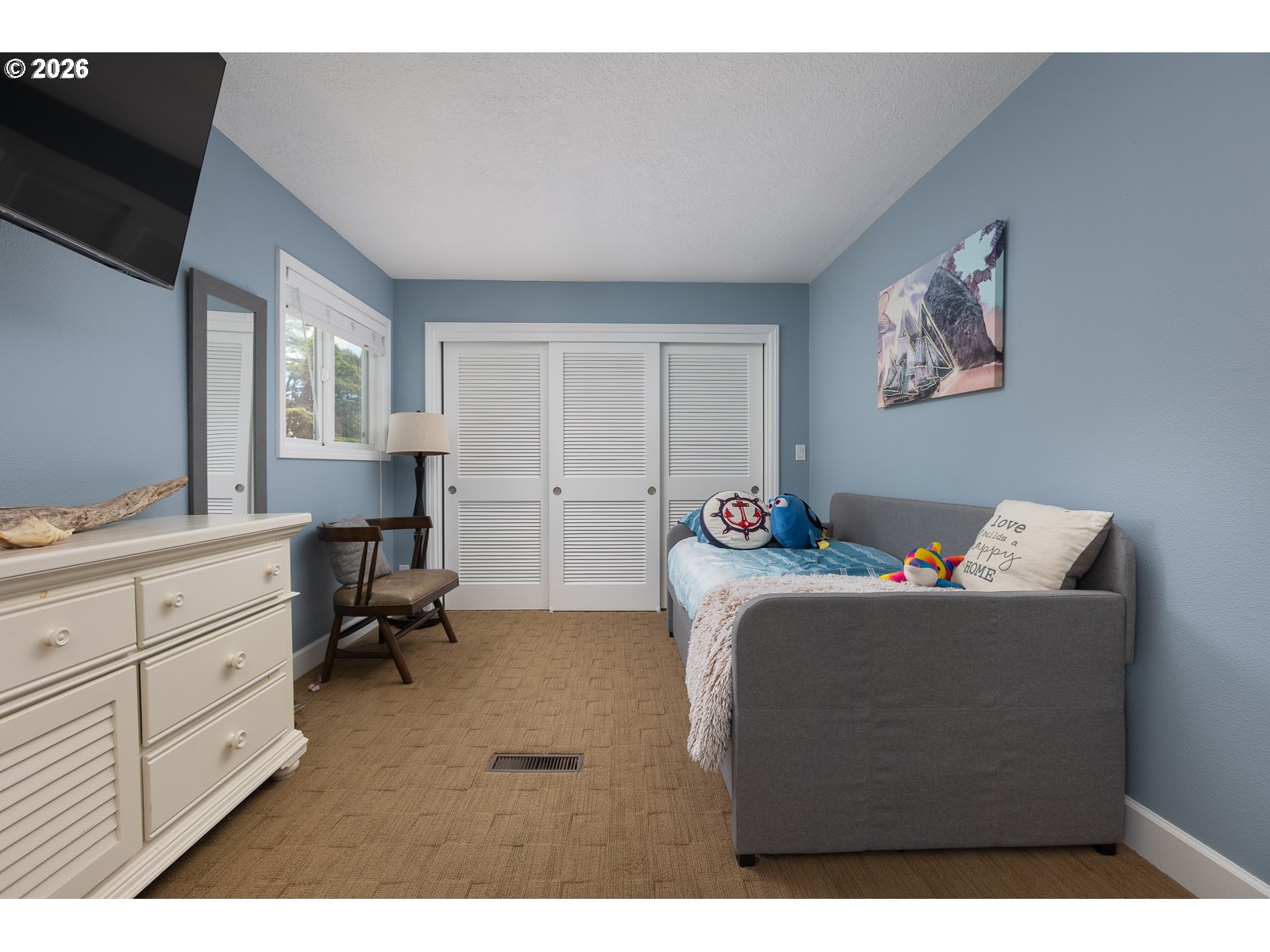 3087 South Hemlock Street Cannon Beach, OR 97110 - Photo 14 of 48 a living room with furniture and a dresser
