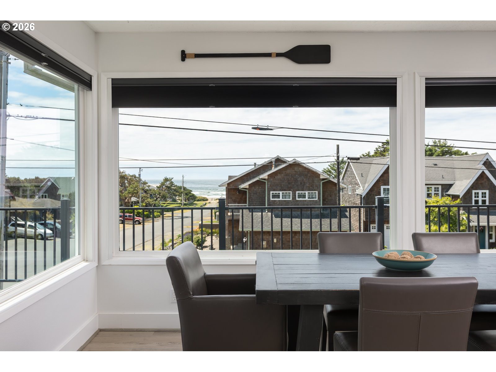 3087 South Hemlock Street Cannon Beach, OR 97110 - Photo 18 of 48 a view of a balcony with furniture