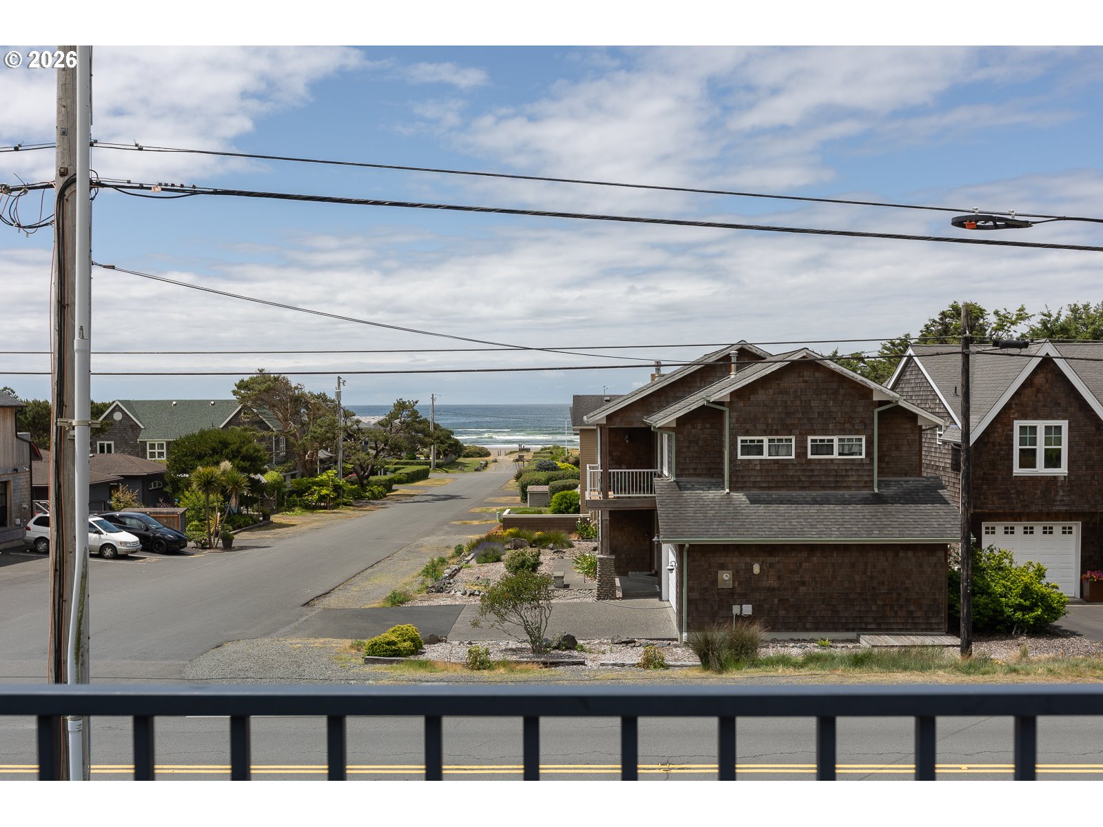 3087 South Hemlock Street Cannon Beach, OR 97110 - Photo 19 of 48 a view of a two chairs in the balcony