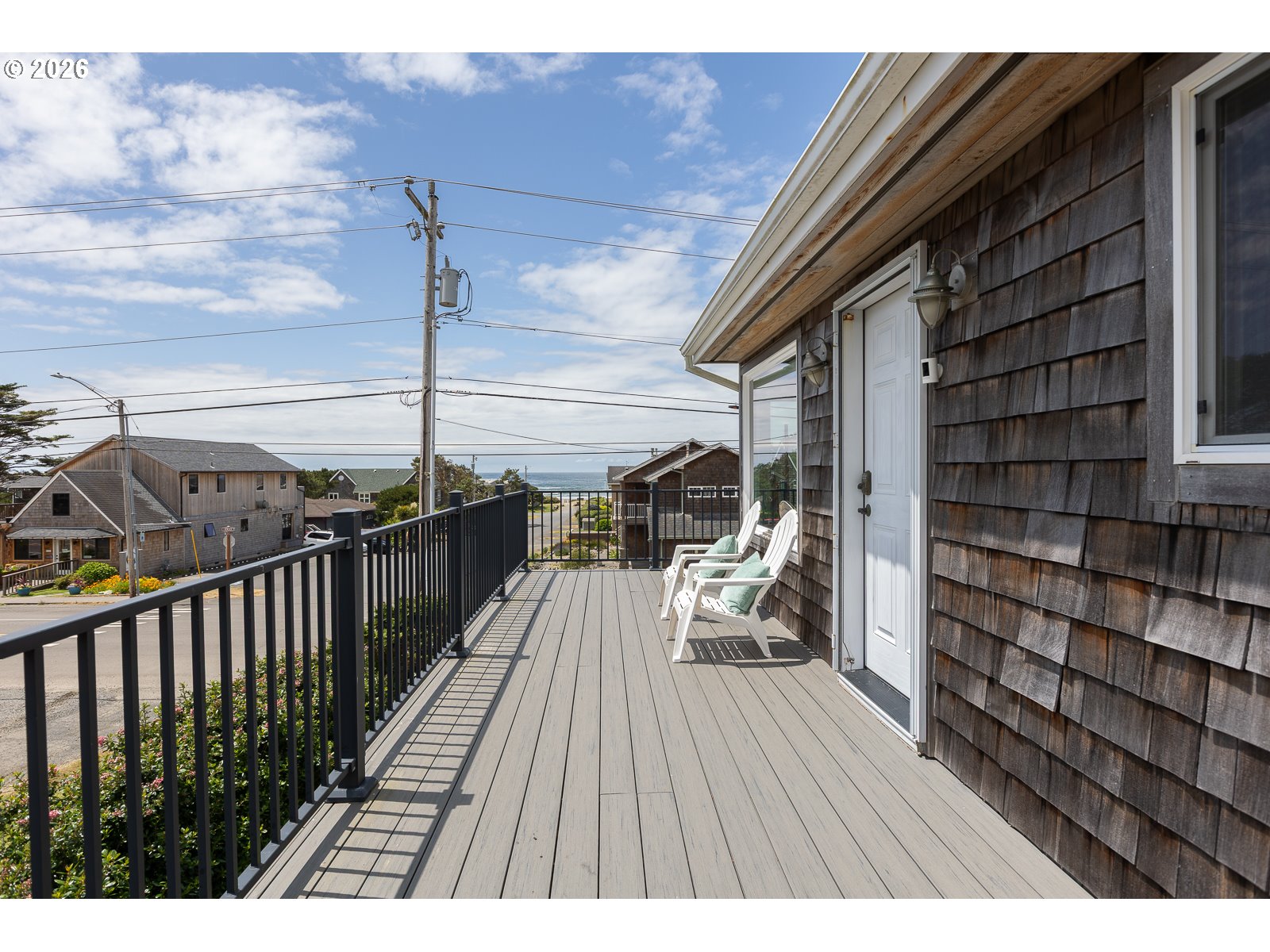 3087 South Hemlock Street Cannon Beach, OR 97110 - Photo 22 of 48 a view of balcony with chairs