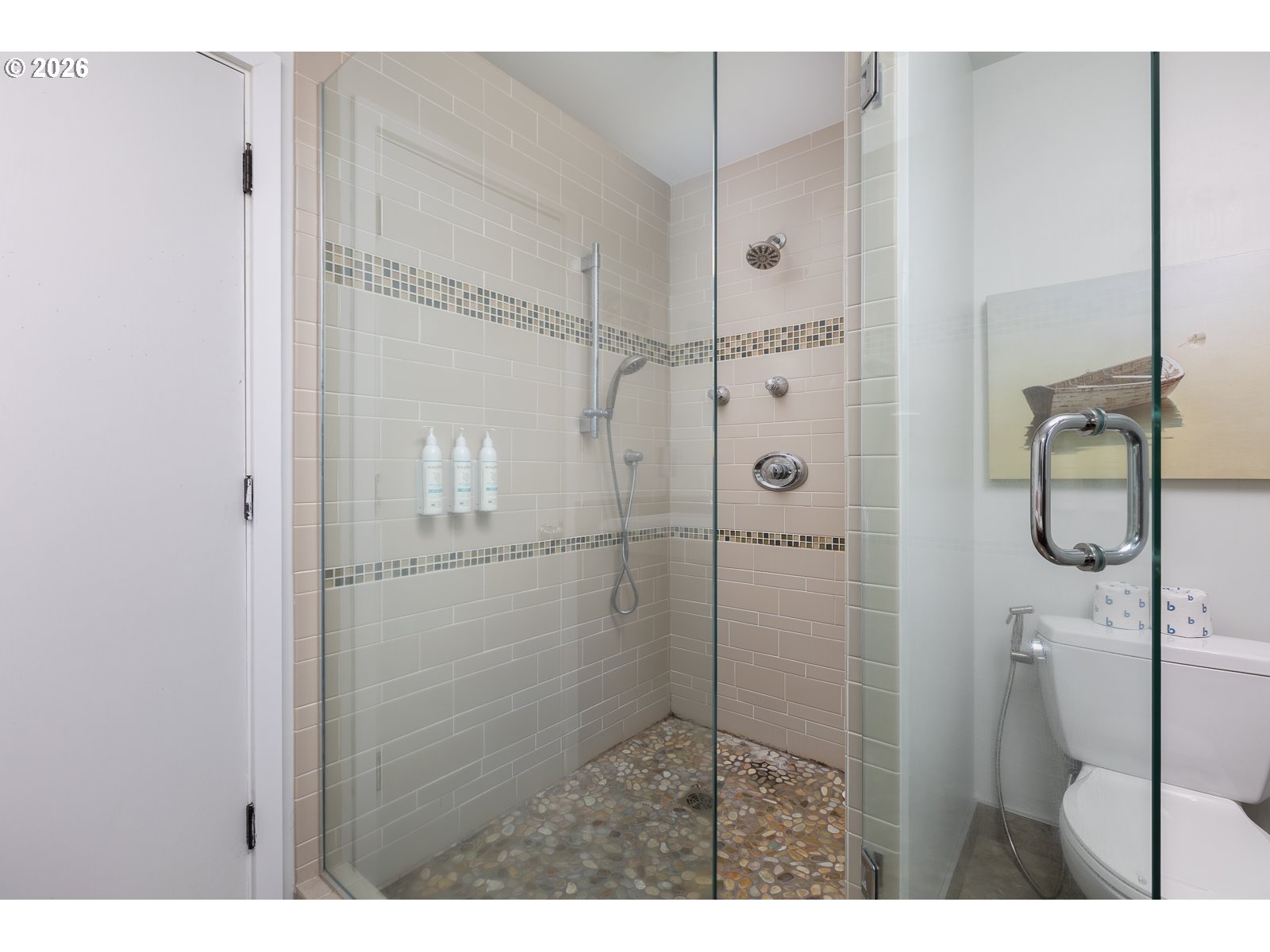 3087 South Hemlock Street Cannon Beach, OR 97110 - Photo 25 of 48 a bathroom with a shower