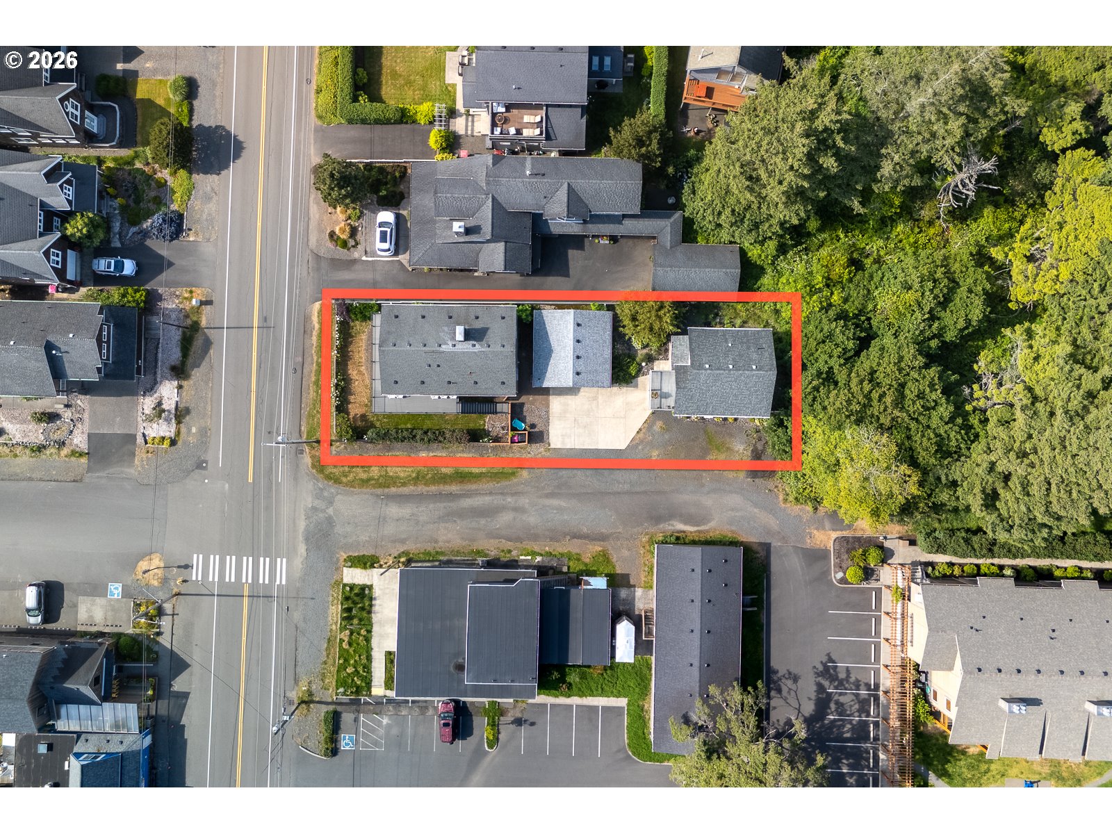3087 South Hemlock Street Cannon Beach, OR 97110 - Photo 3 of 48 an aerial view of a house with a swimming pool