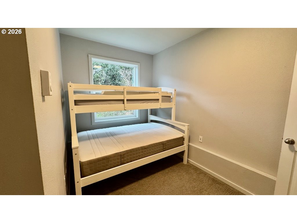 3087 South Hemlock Street Cannon Beach, OR 97110 - Photo 42 of 48 a bathroom with a sink and a mirror