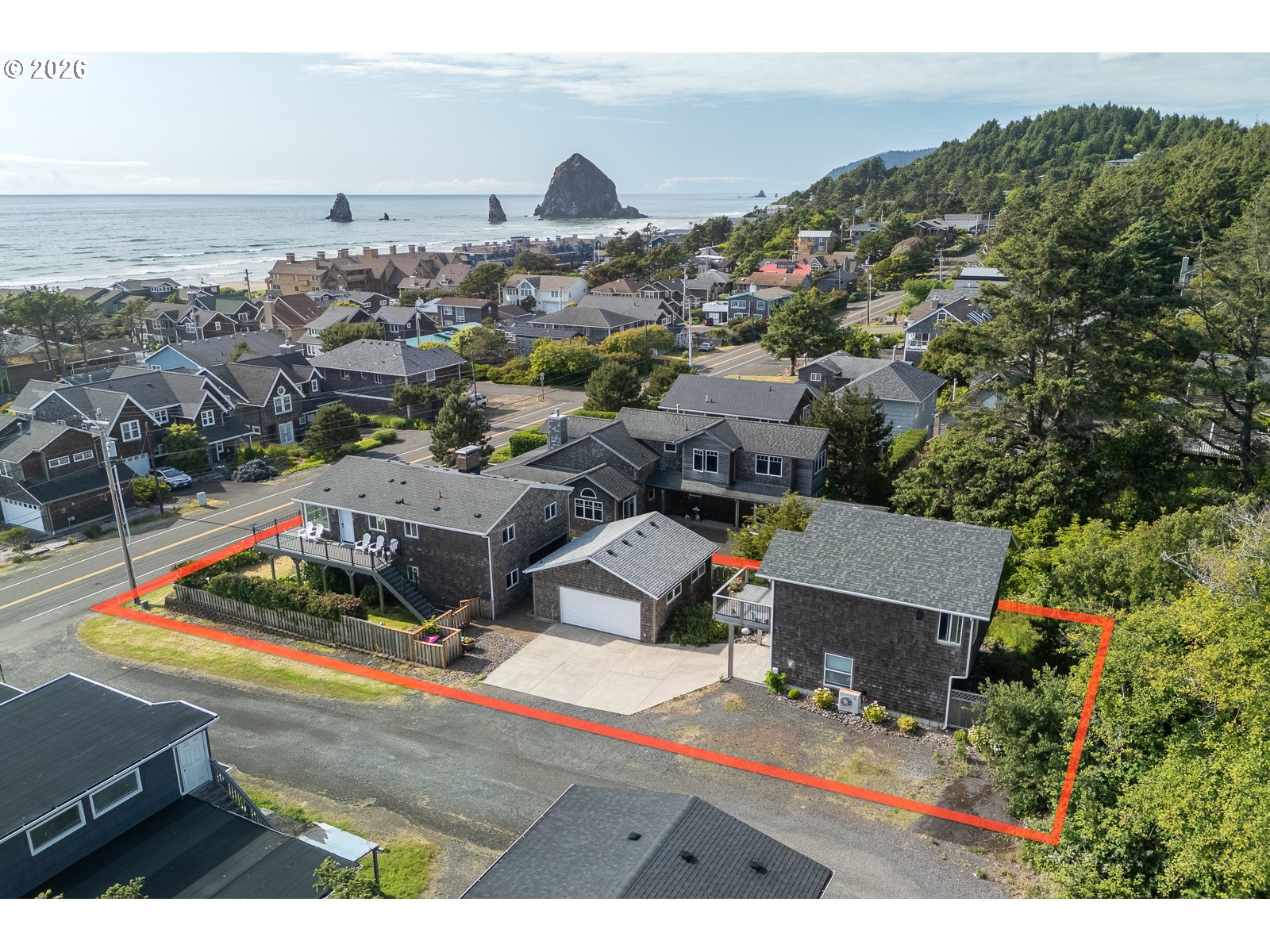 3087 South Hemlock Street Cannon Beach, OR 97110 - Photo 44 of 48 an aerial view of residential houses with outdoor space