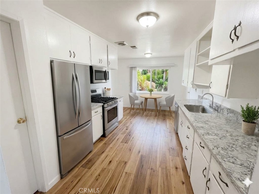 8868 Randolph Street Riverside, CA 92503 - Photo 5 of 21 Digitally enhanced artist's rendering of potential kitchen
