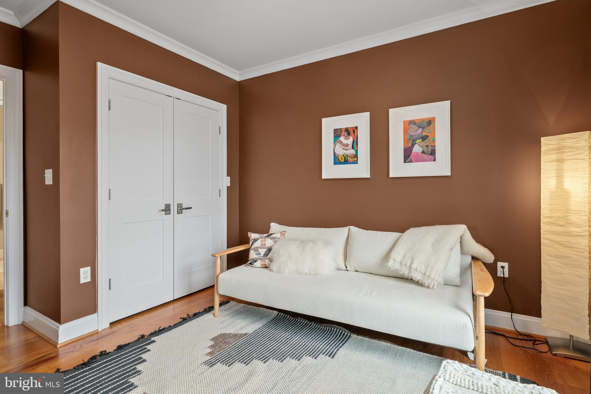 3131 9th Road North, Unit 44 Arlington, VA 22201 - Photo 22 of 33 a bedroom with a bed and a couch