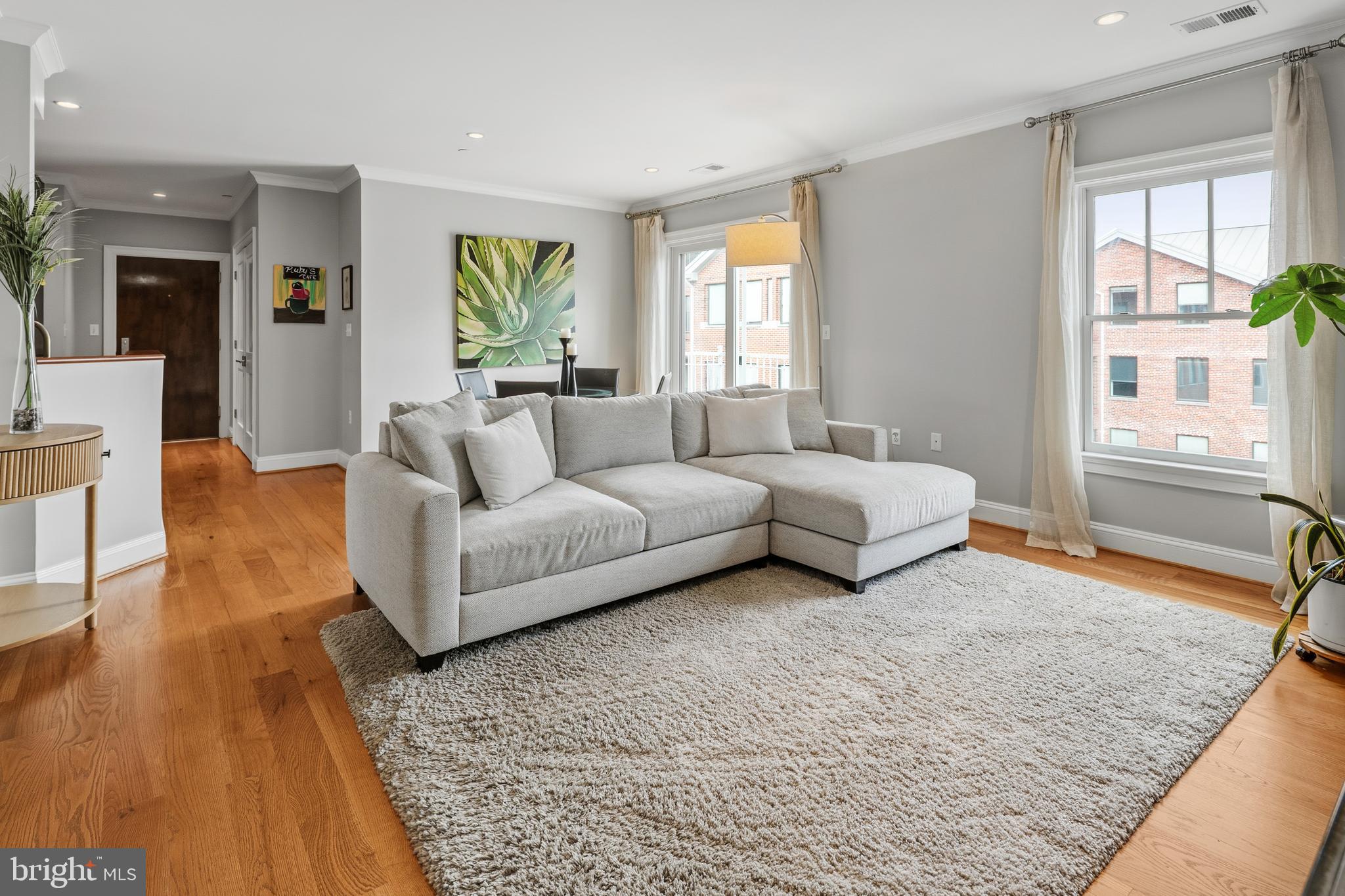 3131 9th Road North, Unit 44 Arlington, VA 22201 - Photo 3 of 33 a living room with furniture and a rug