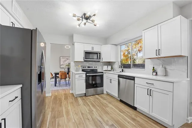 $475,000 | 7904 Rosehill Road, Lenexa, KS 66215