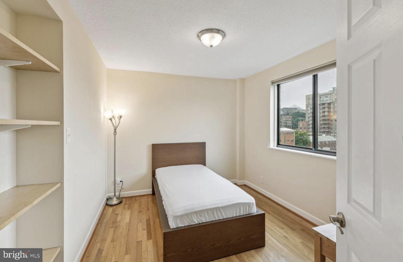 1401 North Rhodes Street, Unit 406 Arlington, VA 22209 - Photo 10 of 14 Bright and airy bedroom retreat.