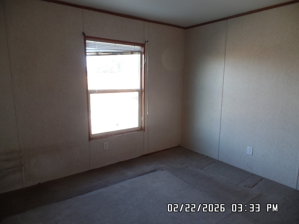 686 Ramar Road Bullhead City, AZ 86442 - Photo 22 of 22 an empty room with a window