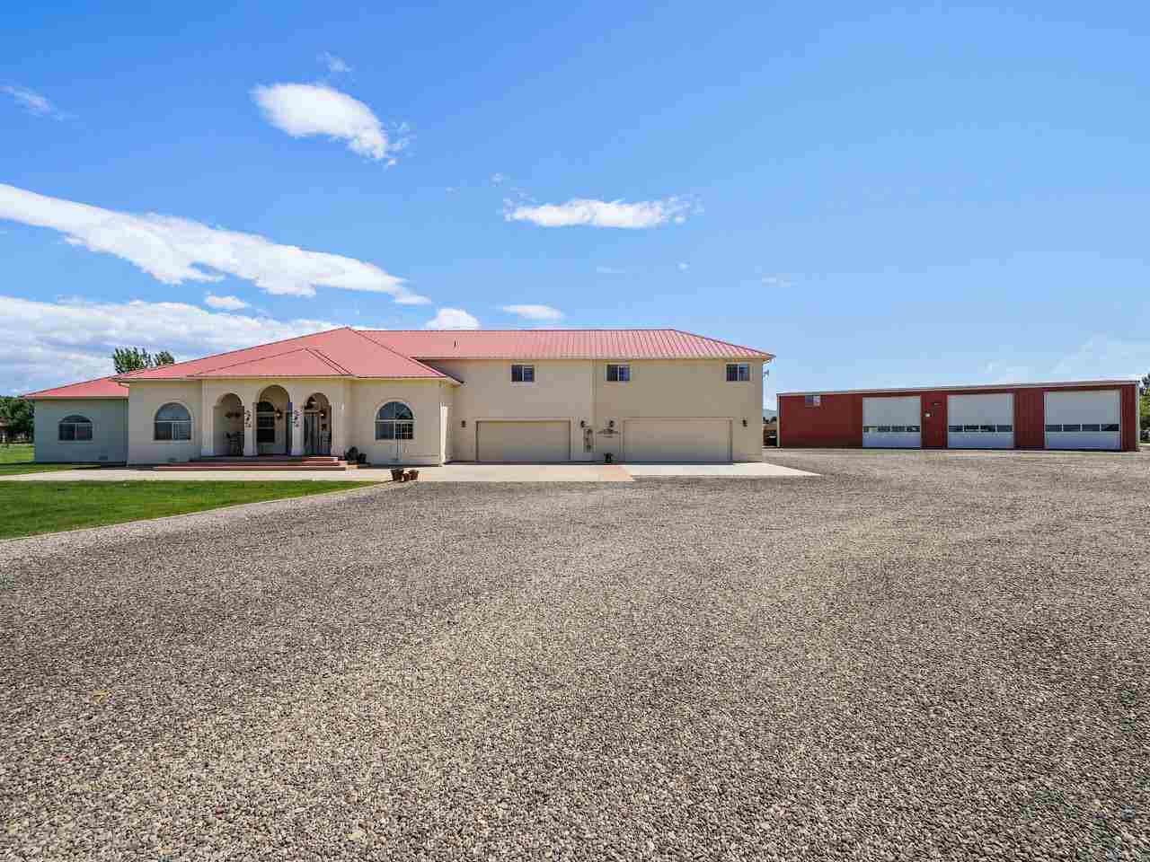 1110 22 Road Grand Junction, CO 81505 - Photo 1 of 42 a view of a house with a yard