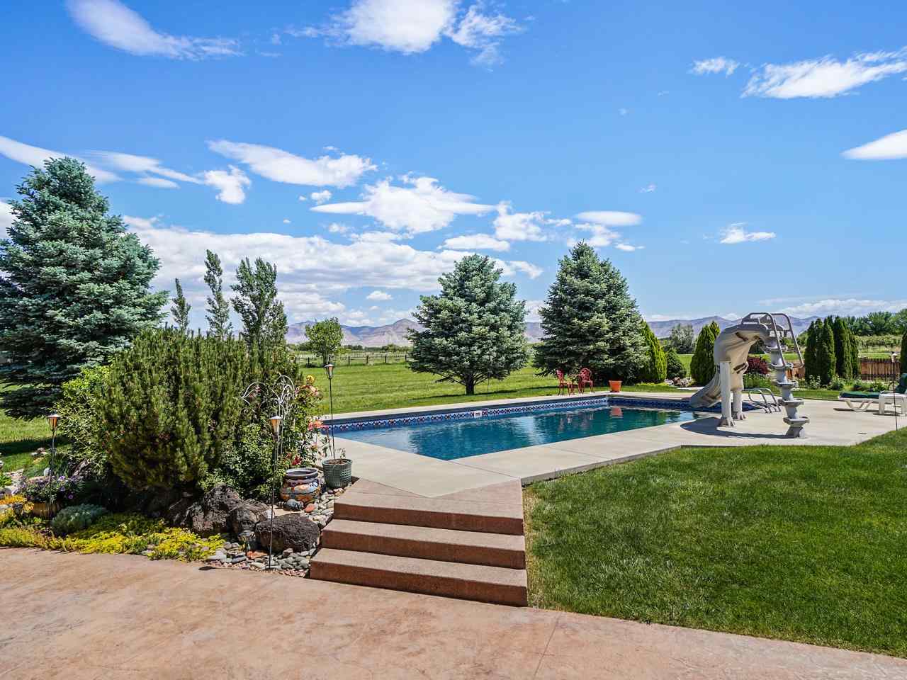 1110 22 Road Grand Junction, CO 81505 - Photo 40 of 42 a view of yard with swimming pool and green space