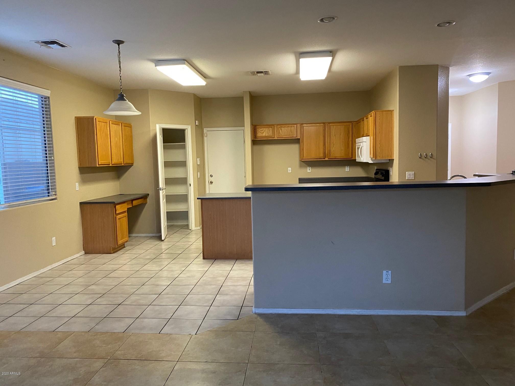 3248 West Shumway Farm Road Phoenix, AZ 85041 - Photo 2 of 16 IMG_1939