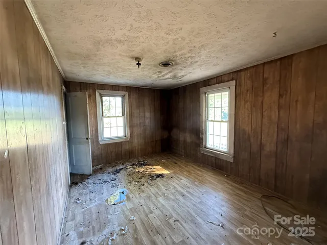 a view of livingroom with hardwood floor and a window