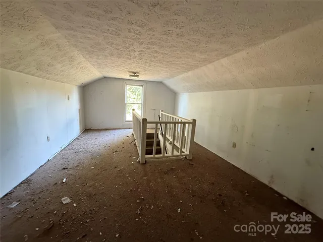 a view of entryway with stairs