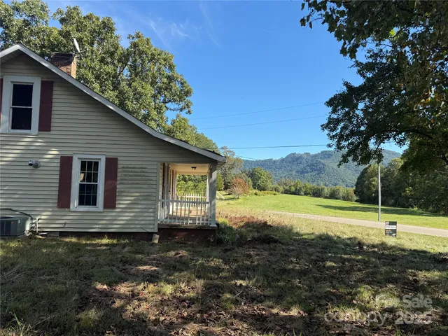 a view of a backyard of the house