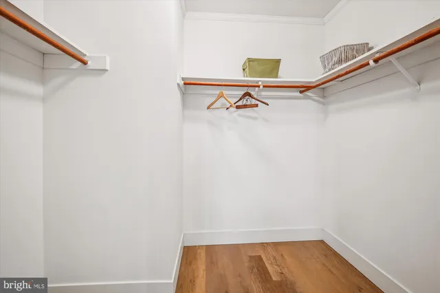 a view of a room with racks on the wall