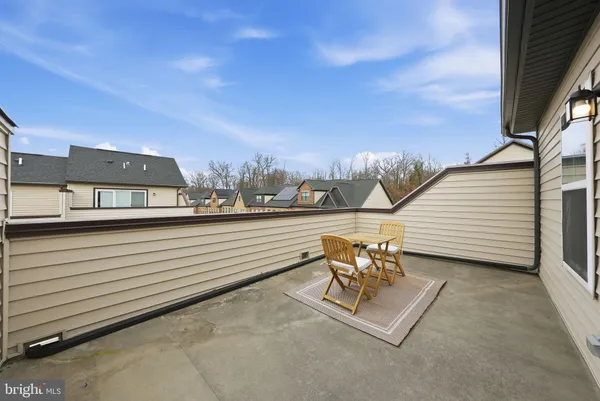 a view of a terrace with sitting area