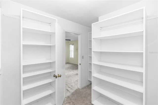 a view of an empty walk in closet
